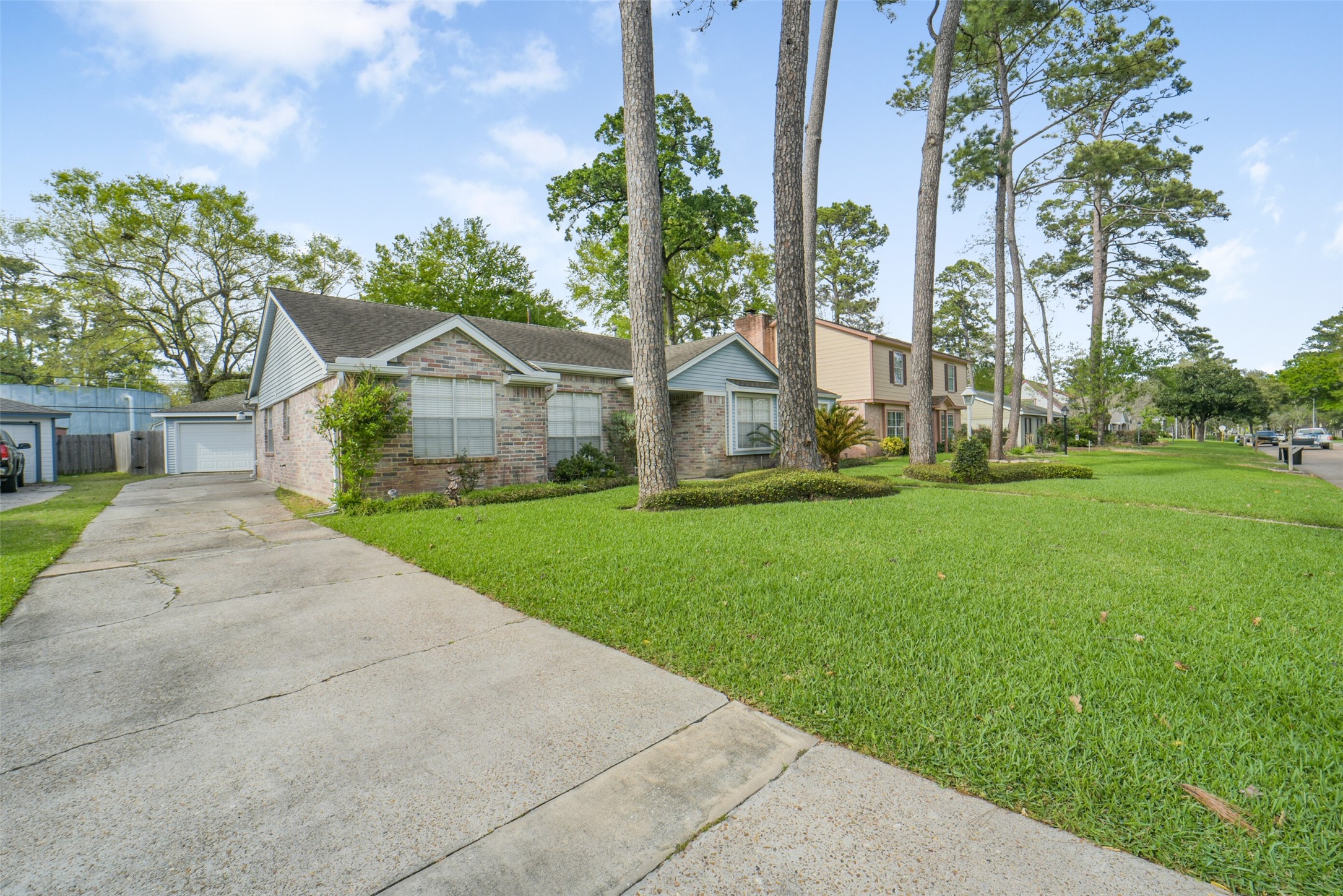 7818 Kleingreen Lane Spring, TX 77379 - Photo 50 of 50 a front view of a house with garden