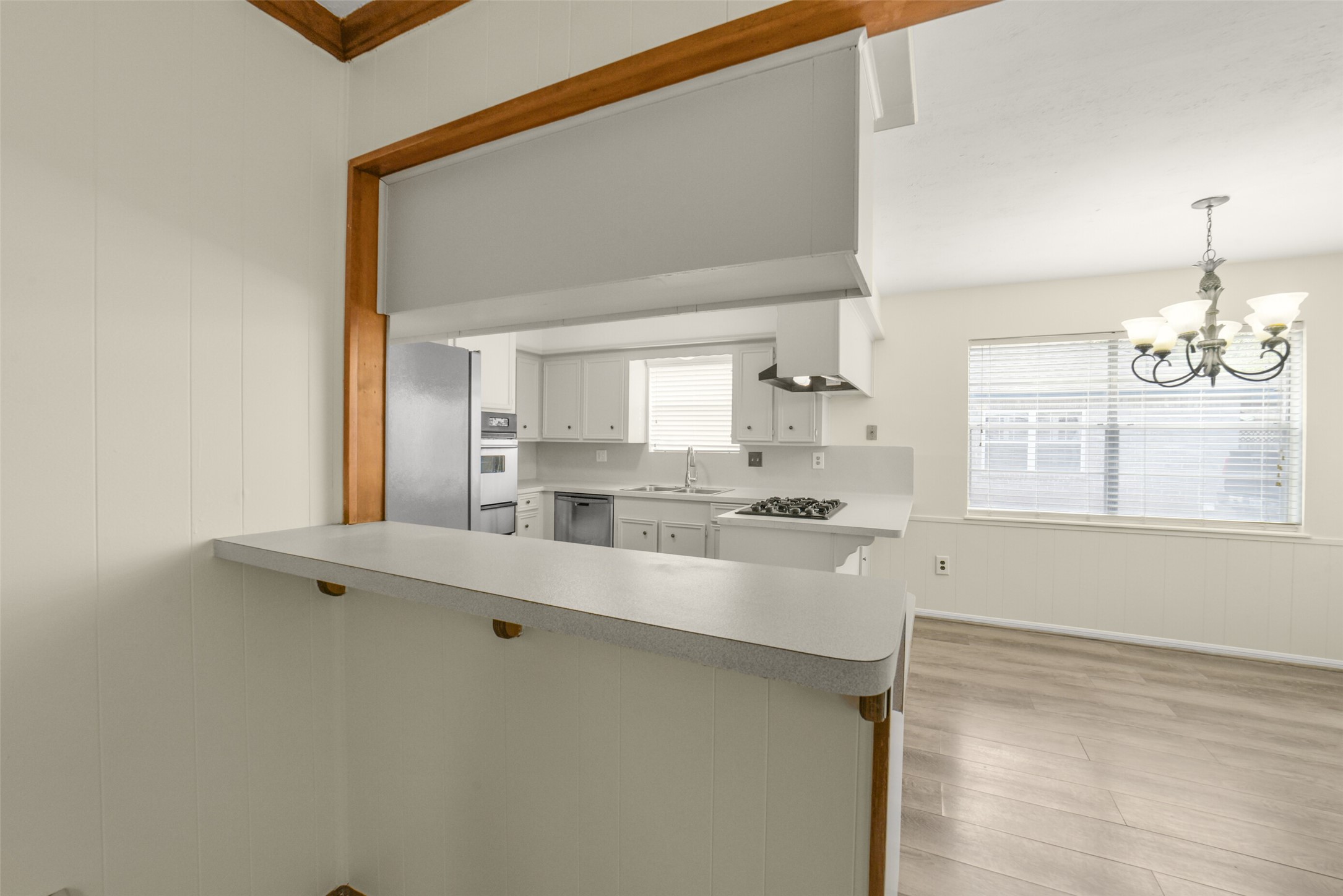 7818 Kleingreen Lane Spring, TX 77379 - Photo 8 of 50 a large white kitchen with a window