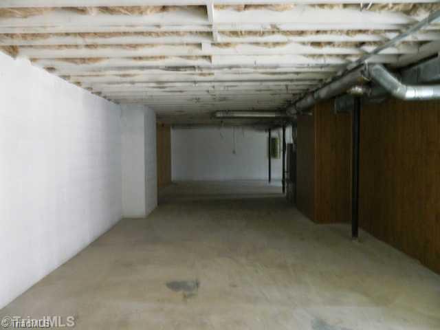 6904 Aplington Road Oak Ridge, NC 27310 - Photo 11 of 14 Other. Large Unfinished Basement Area
