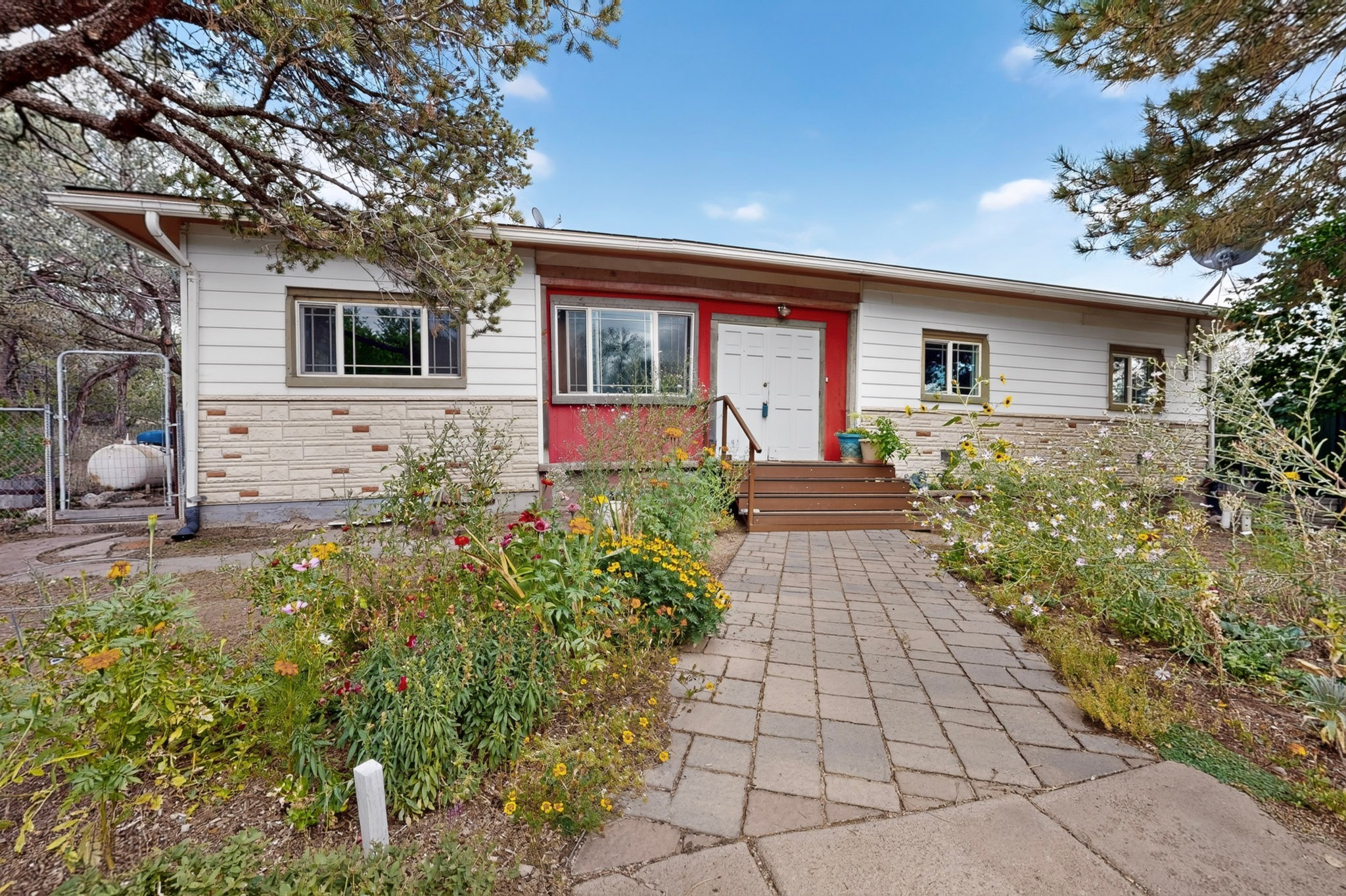 5 County Rd B51A Pecos, NM 87552 - Photo 47 of 64 Flower gardens on each side of the front entrance