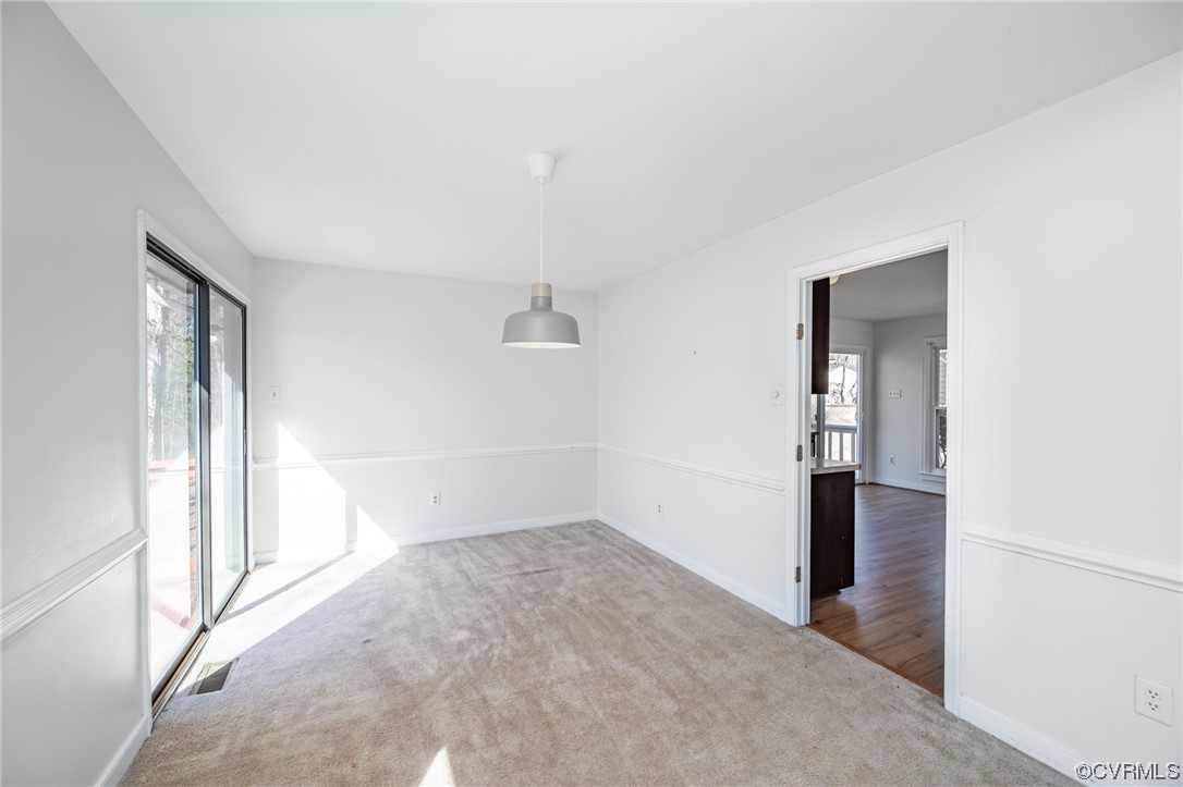 3022 3 Bridges Road Midlothian, VA 23112 - Photo 8 of 26 an empty room with a natural light