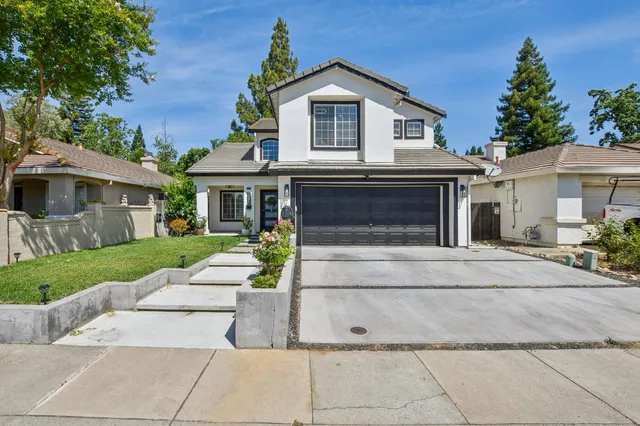front view of house with a yard