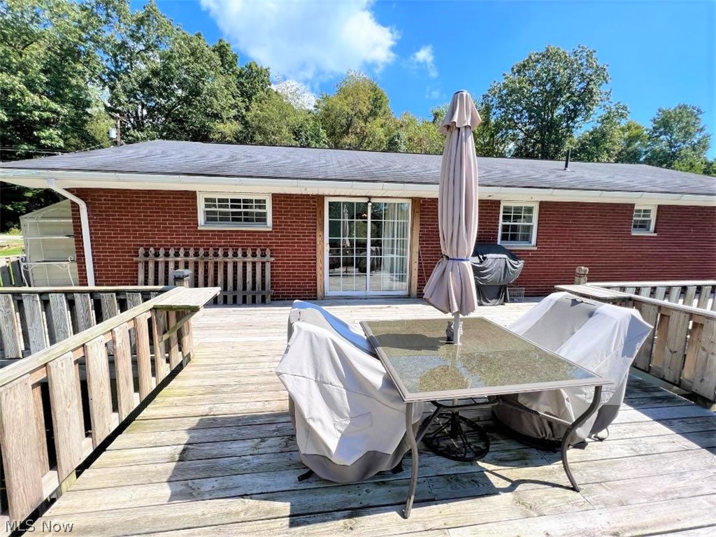 3080 Dutch Ridge Road Parkersburg, WV 26104 - Photo 21 of 29 Just look at this nice space for those outside times you wish to dine and/or entertain. Just open the slider doors and come on out to fresh air space and enjoy !