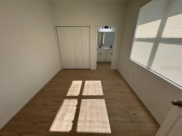 a view of hallway with windows