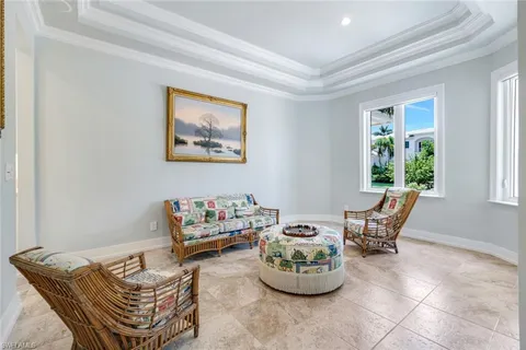 a living room with furniture and window