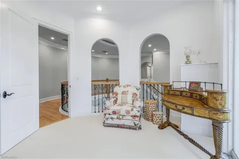 a en suite bathroom with double vanity sinks and a mirror