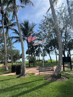 a front view of a building and a big yard