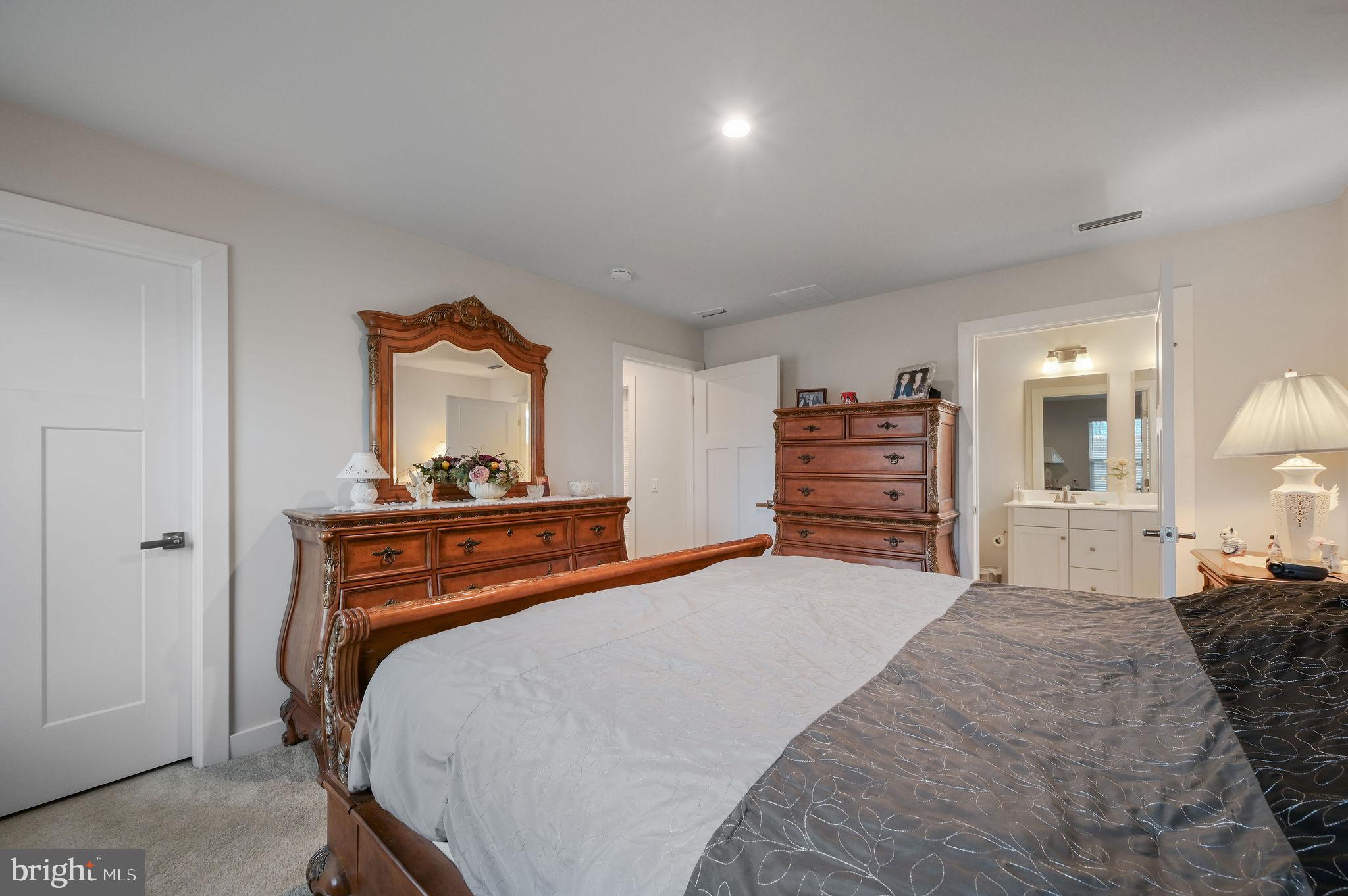 421 Laertes Drive Dover, DE 19901 - Photo 20 of 29 a bed room with a bed and a television