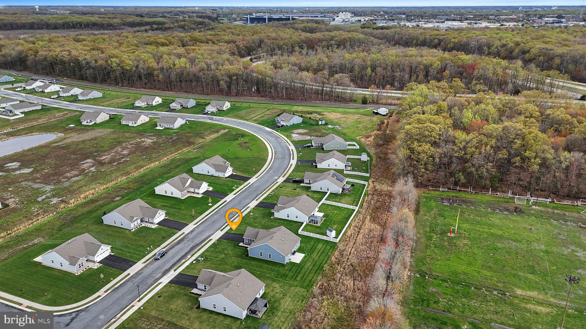 421 Laertes Drive Dover, DE 19901 - Photo 29 of 29 a view of a lake with a yard