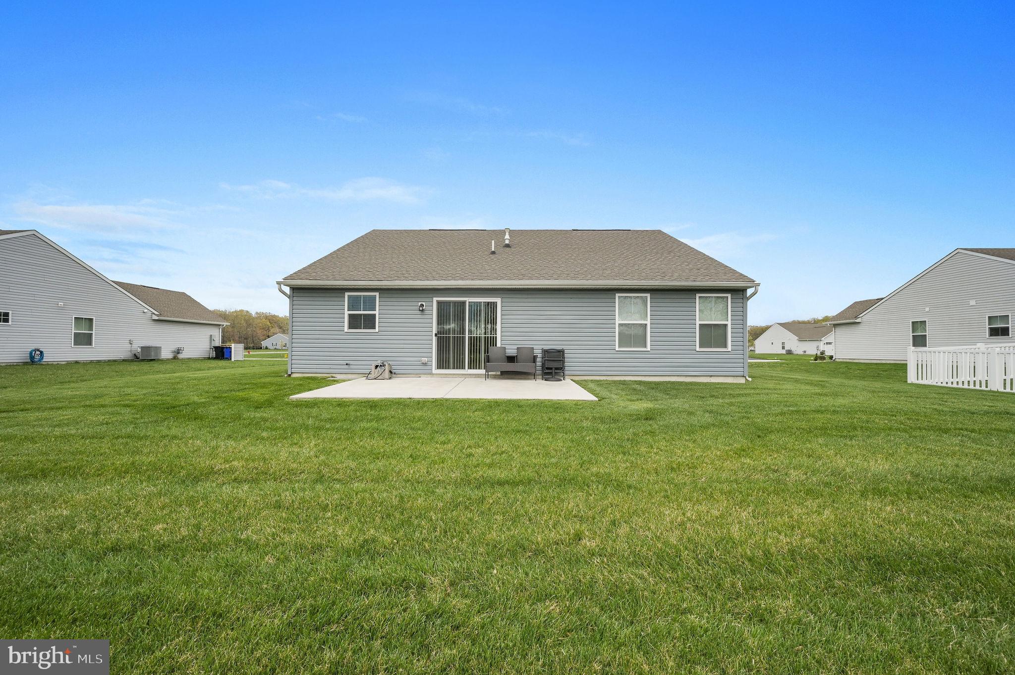 421 Laertes Drive Dover, DE 19901 - Photo 3 of 29 a front view of a house with a yard