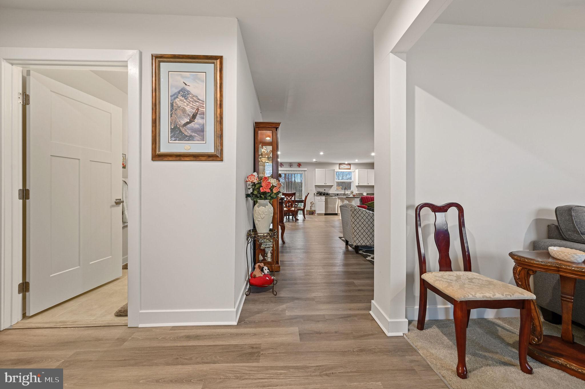 421 Laertes Drive Dover, DE 19901 - Photo 5 of 29 a dining room with wooden floor and dining room