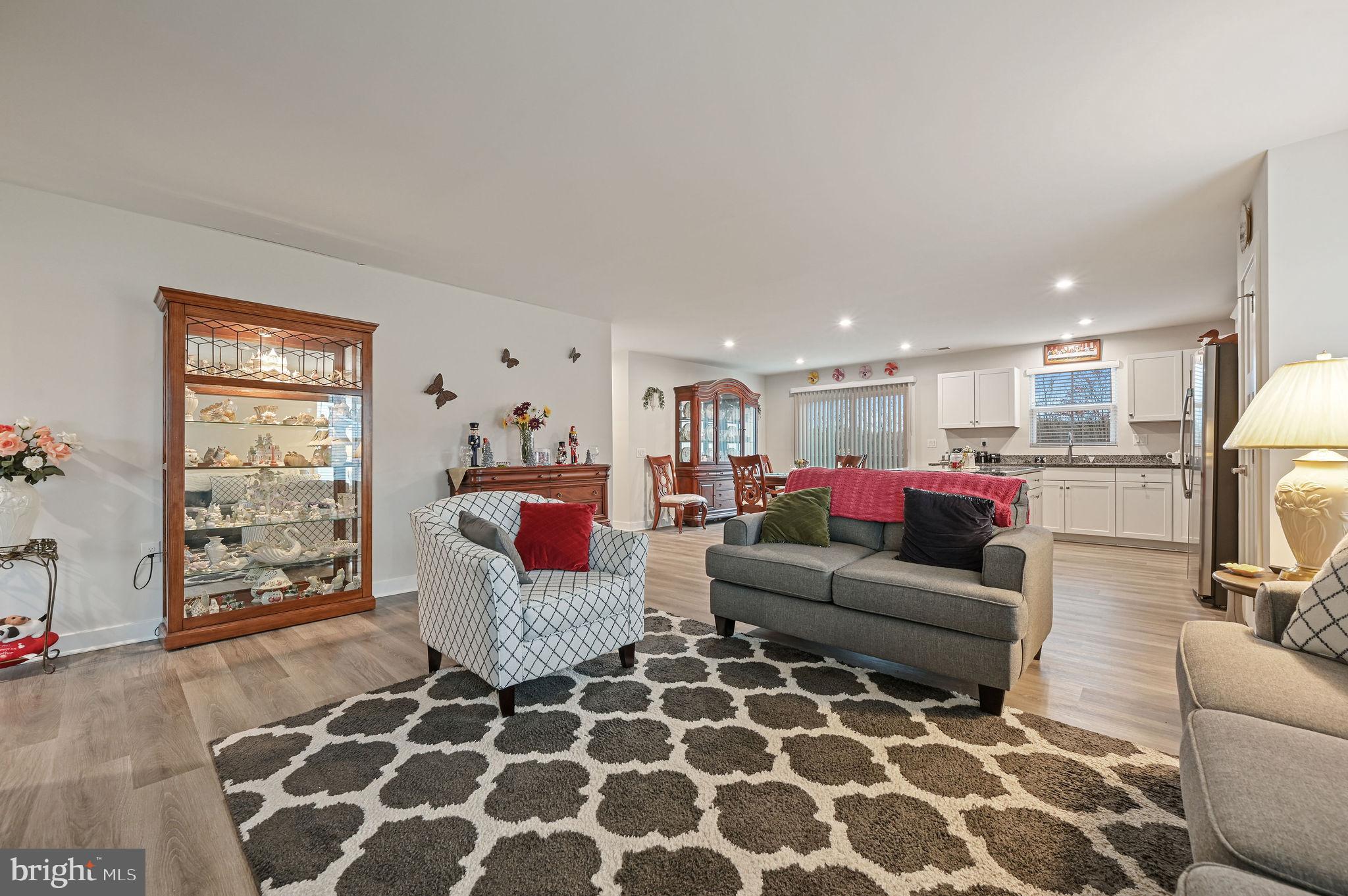 421 Laertes Drive Dover, DE 19901 - Photo 7 of 29 a living room with furniture and a couch