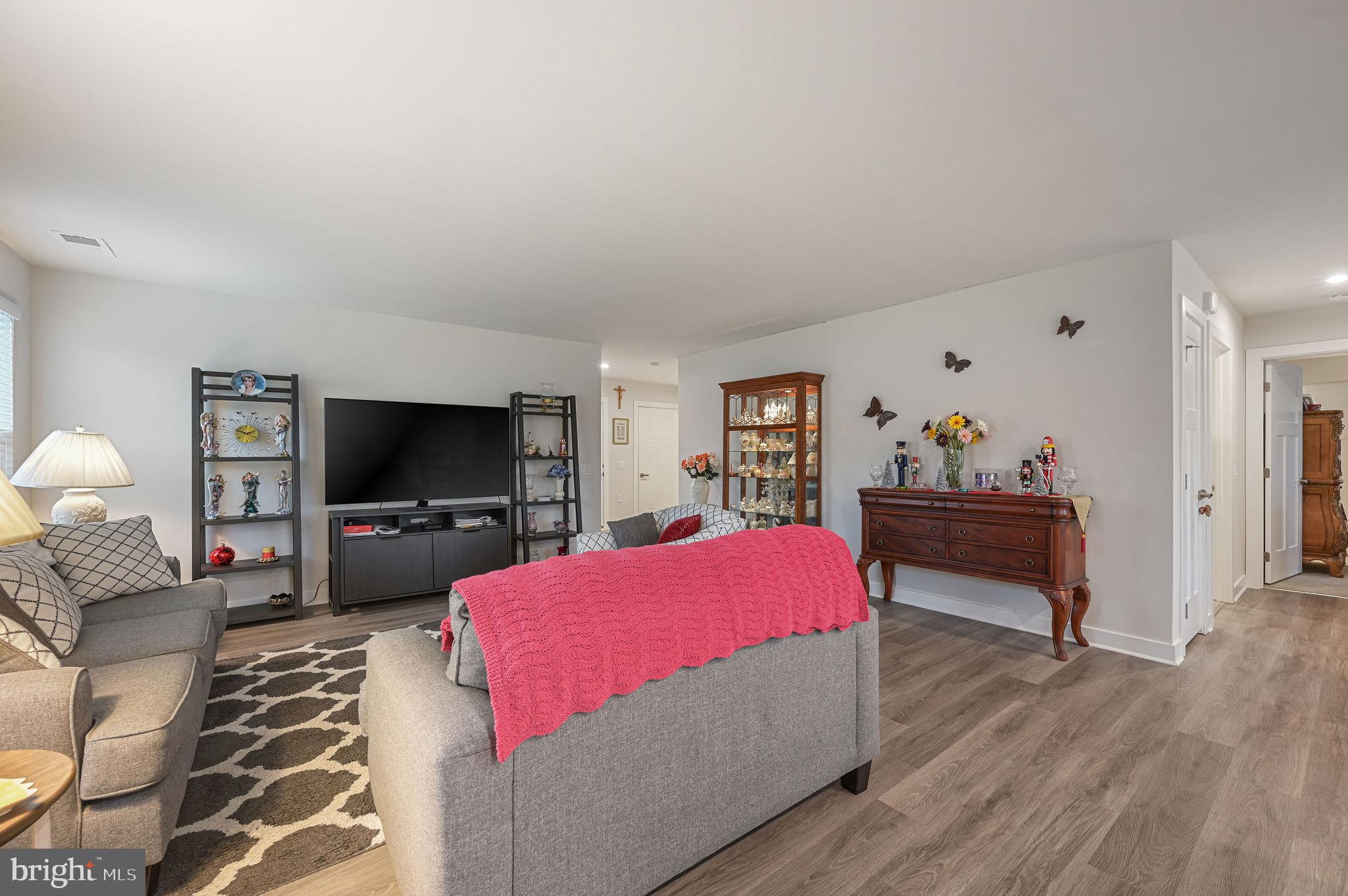 421 Laertes Drive Dover, DE 19901 - Photo 10 of 29 a bedroom with furniture and a flat screen tv