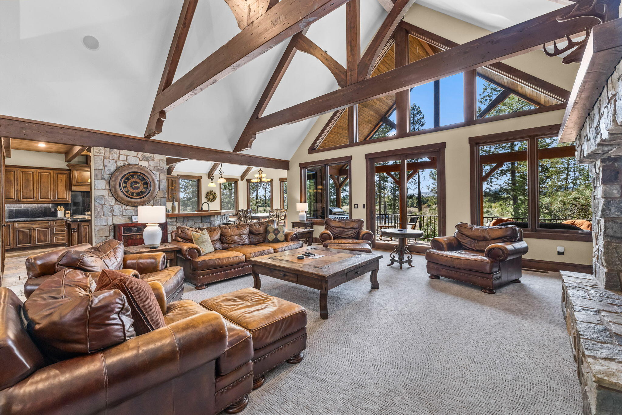 56373 Trailmere Circle Bend, OR 97707 - Photo 14 of 102 a living room with furniture and a large window
