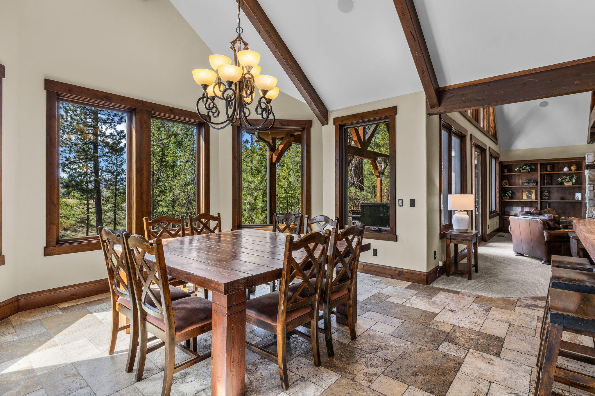 56373 Trailmere Circle Bend, OR 97707 - Photo 16 of 102 a view of a dining room with furniture window and outside view