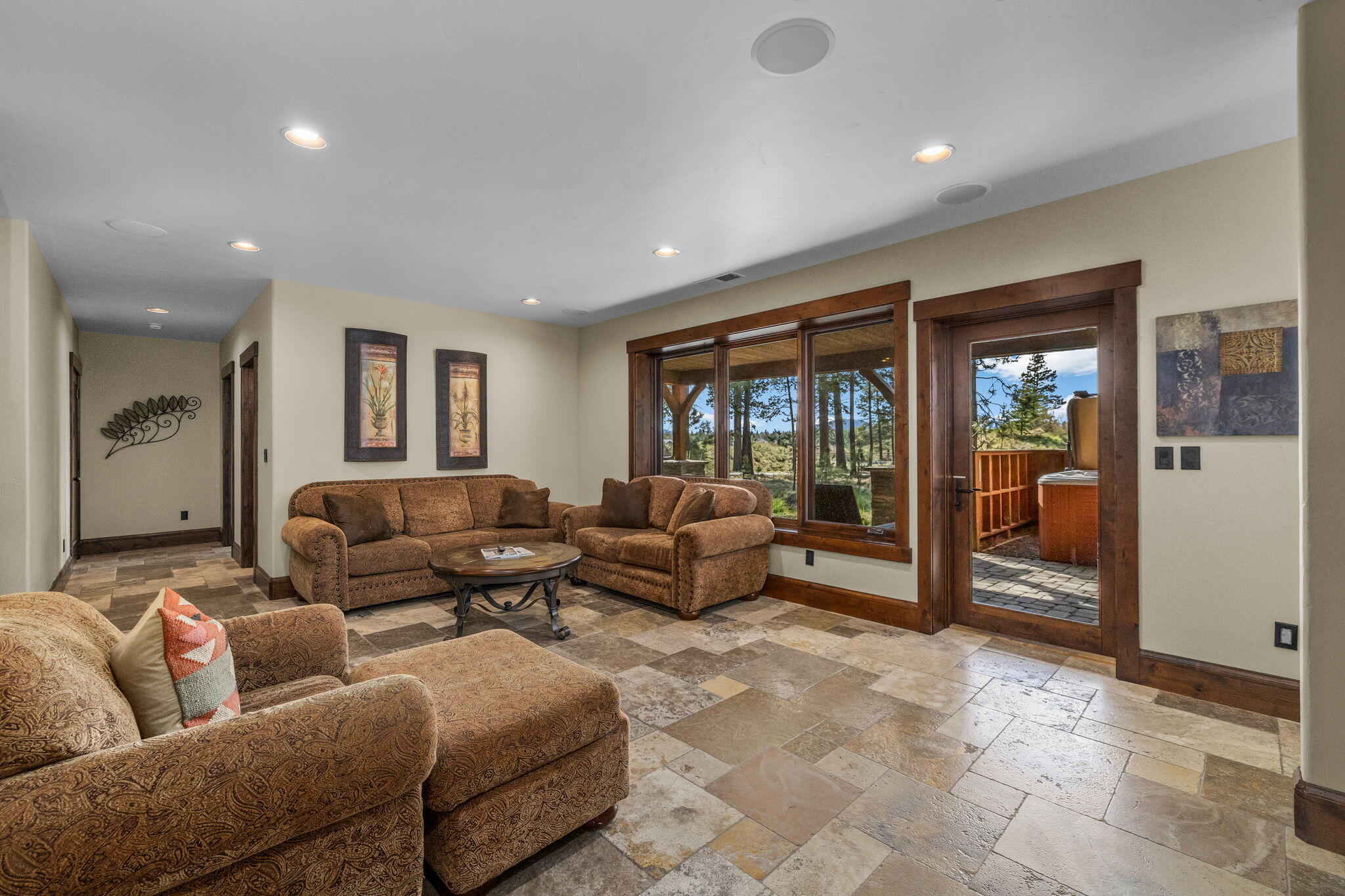 56373 Trailmere Circle Bend, OR 97707 - Photo 47 of 102 a living room with furniture and large window