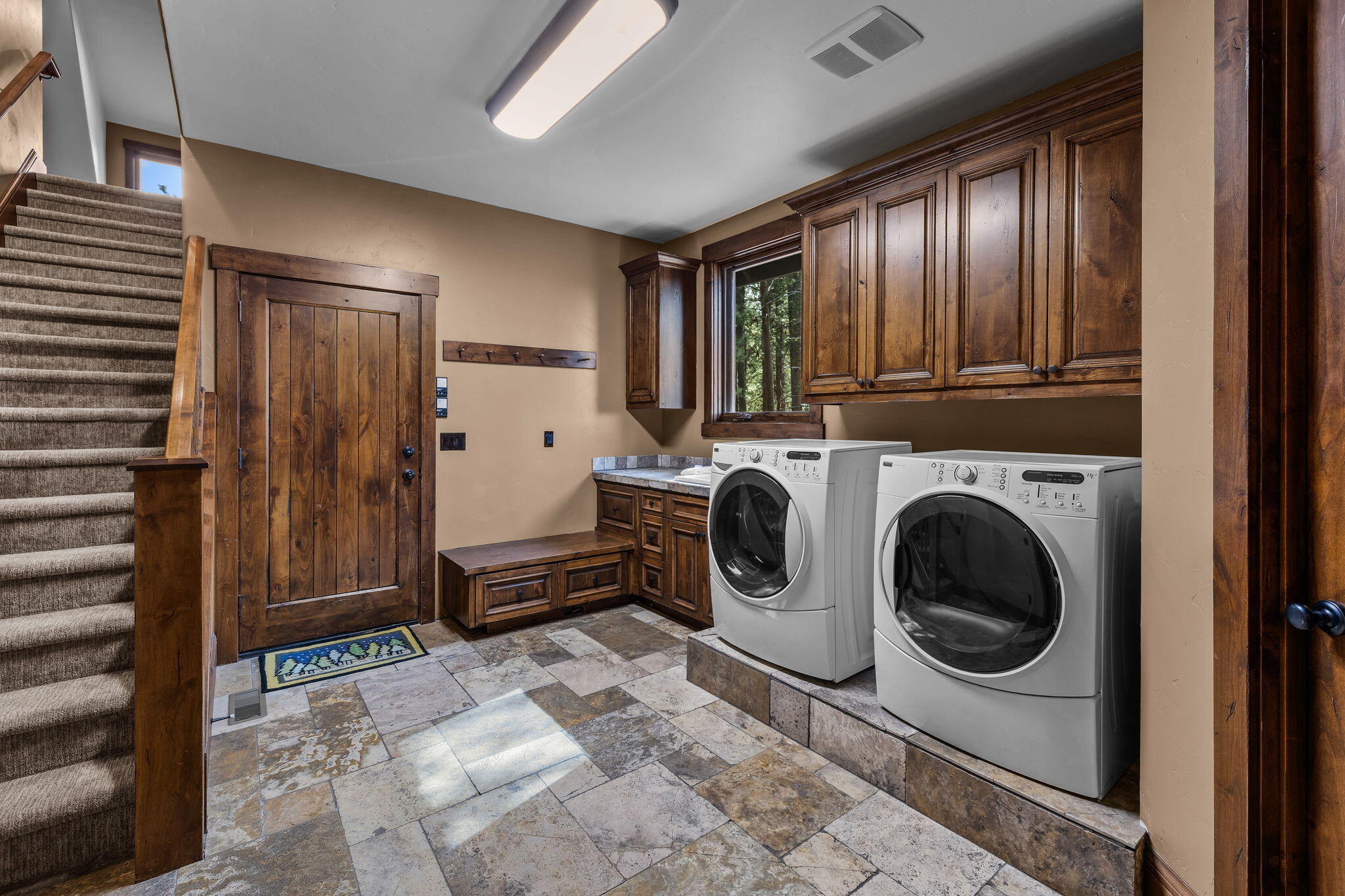 56373 Trailmere Circle Bend, OR 97707 - Photo 64 of 102 a utility room with dryer and washer