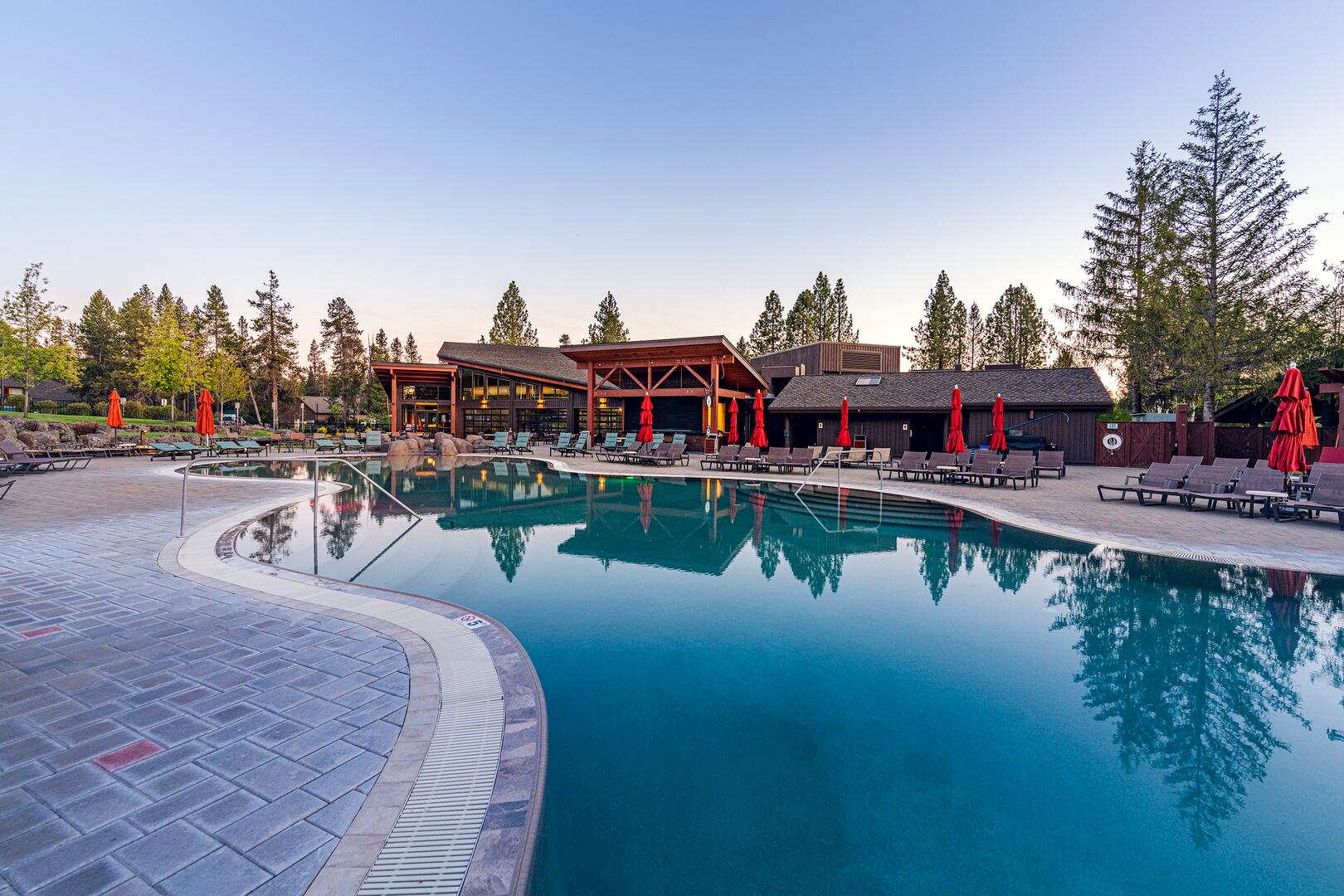 56373 Trailmere Circle Bend, OR 97707 - Photo 91 of 102 a view of a lake with a house swimming pool and outdoor space