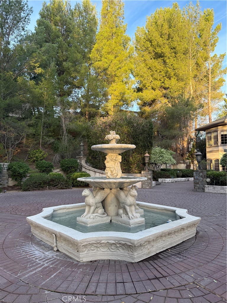 380 North Chandler Ranch Road Orange, CA 92869 - Photo 2 of 40 a view of a fountain with big trees