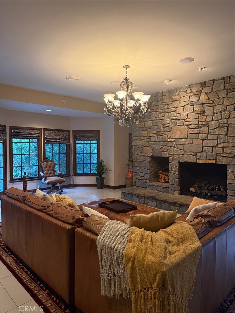 380 North Chandler Ranch Road Orange, CA 92869 - Photo 23 of 40 a living room with furniture and a fireplace