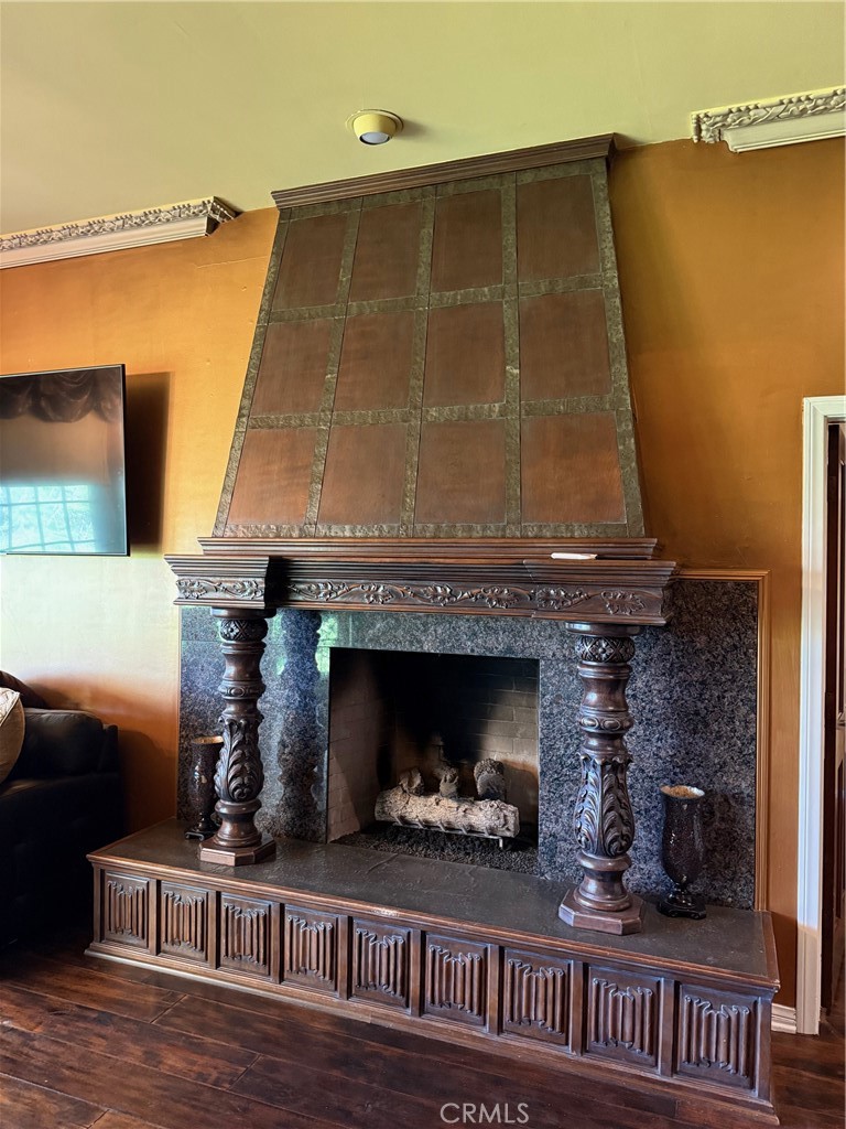 380 North Chandler Ranch Road Orange, CA 92869 - Photo 30 of 40 a living room with furniture and a fireplace