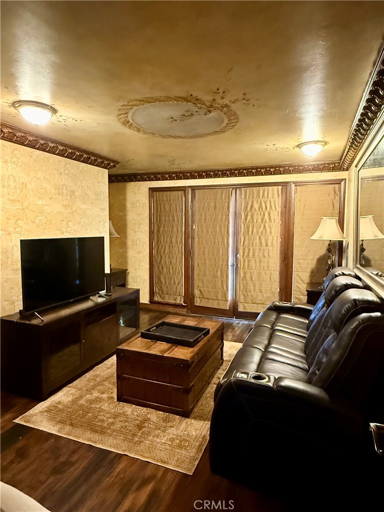 380 North Chandler Ranch Road Orange, CA 92869 - Photo 31 of 40 a bedroom with a bed and a flat screen tv