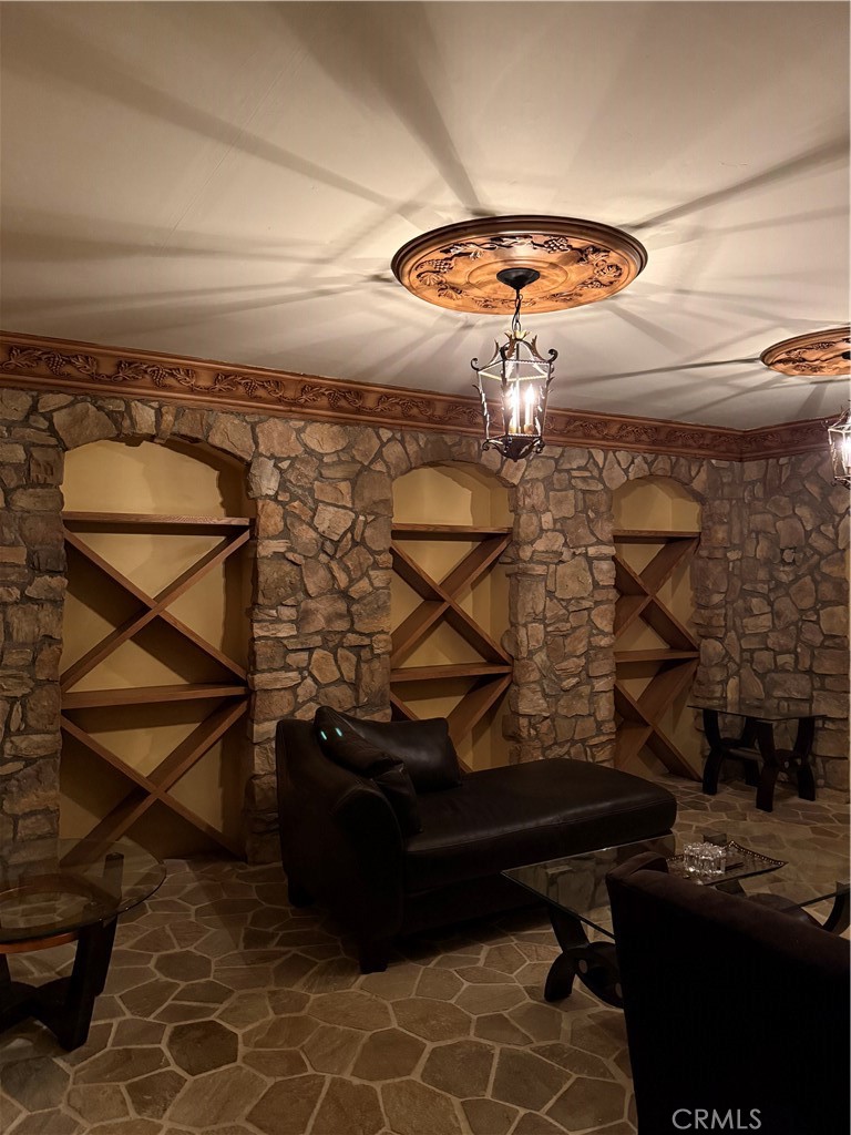 380 North Chandler Ranch Road Orange, CA 92869 - Photo 37 of 40 a room with table chairs and a stove