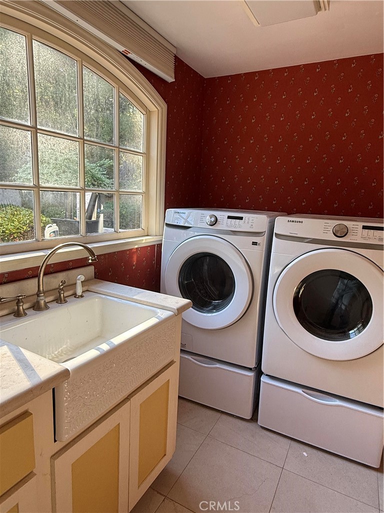 380 North Chandler Ranch Road Orange, CA 92869 - Photo 39 of 40 a utility room with dryer and washer