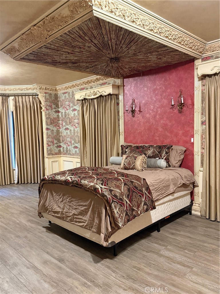 380 North Chandler Ranch Road Orange, CA 92869 - Photo 6 of 40 a bed sitting in a bedroom next to a window