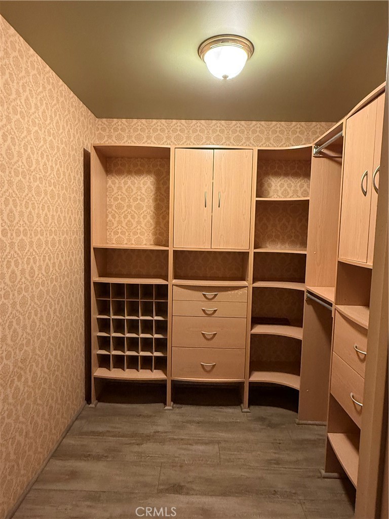 380 North Chandler Ranch Road Orange, CA 92869 - Photo 10 of 40 an empty room with wooden floor and windows