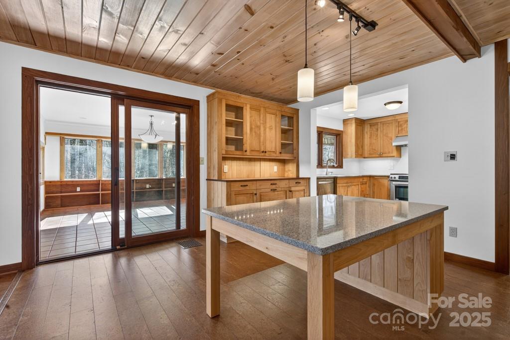 241 Pinefield Drive Tryon, NC 28782 - Photo 11 of 39 a kitchen with counter top space and wooden floor