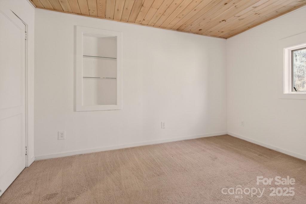 241 Pinefield Drive Tryon, NC 28782 - Photo 24 of 39 an empty room with windows