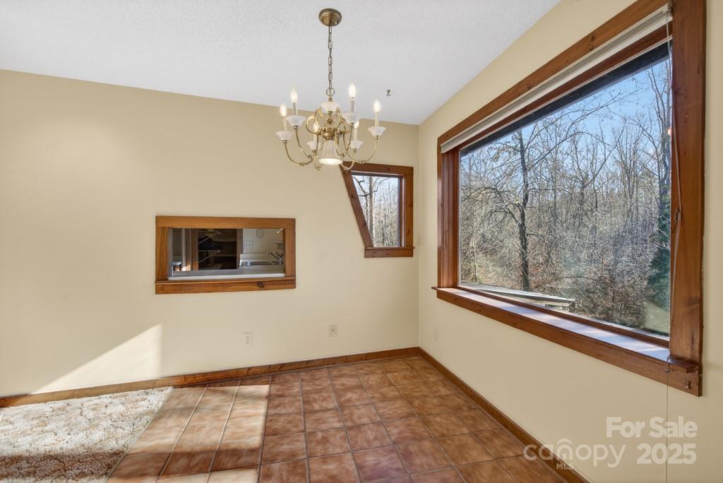 241 Pinefield Drive Tryon, NC 28782 - Photo 29 of 39 a view of an empty room with a window
