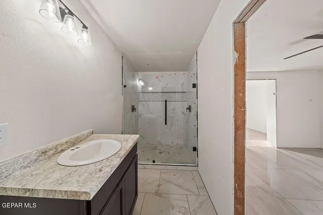 view of a bathroom sink and a mirror