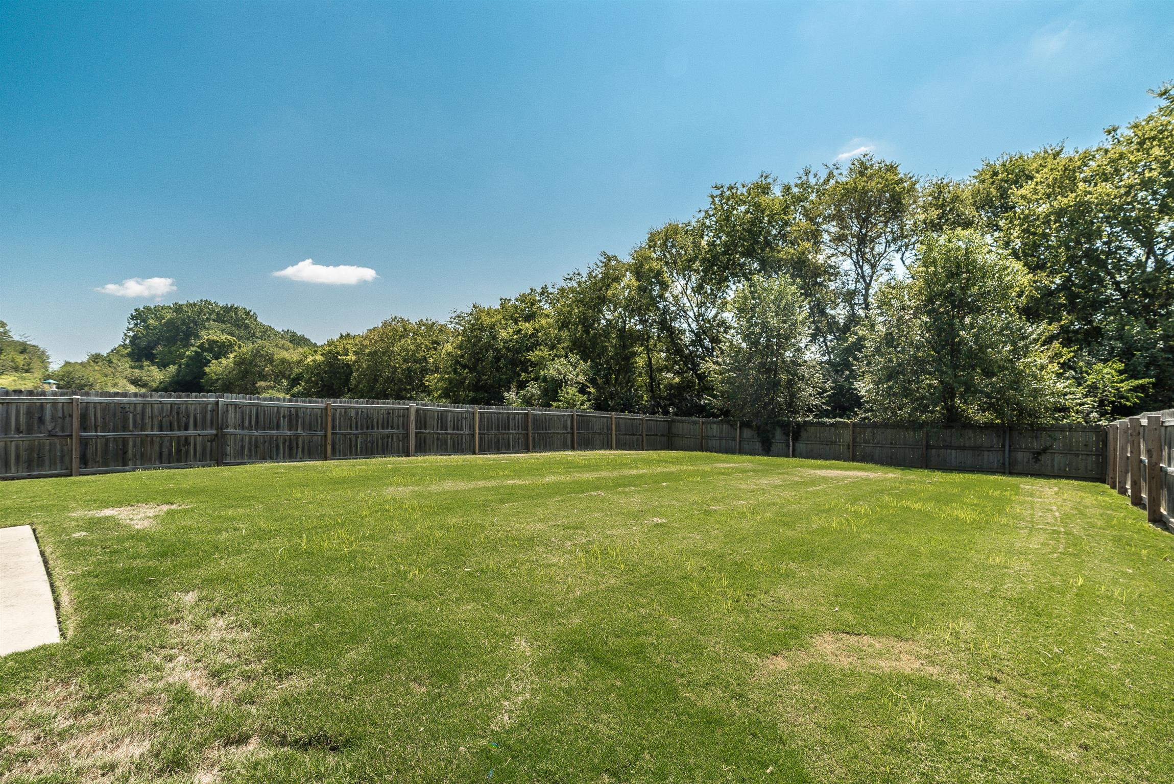 1007 Benwick Road Hendersonville, TN 37075 - Photo 3 of 27 Privacy fenced back yard backs up to farm land.