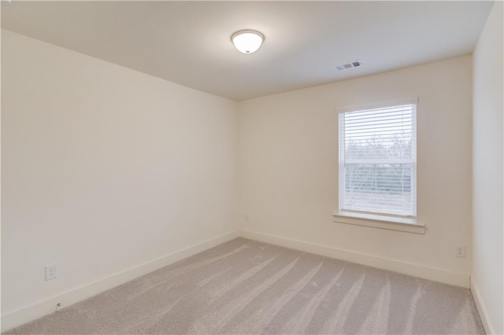 74 Cannon Trace Drive Winder, GA 30680 - Photo 27 of 42 an empty room with a window