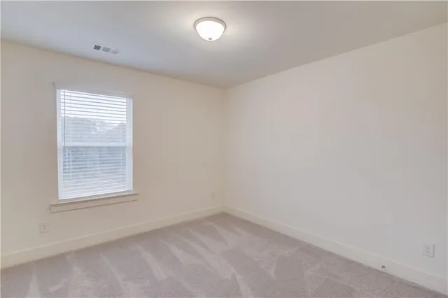 a view of small space with racks on the wall