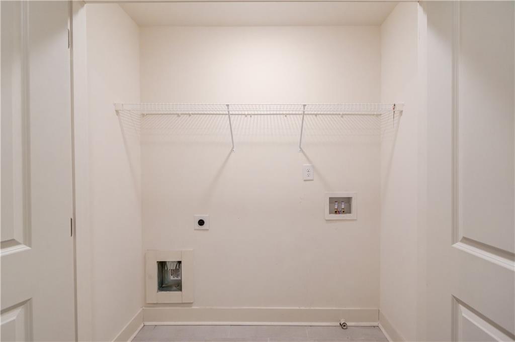 74 Cannon Trace Drive Winder, GA 30680 - Photo 32 of 42 a view of small space with racks on the wall