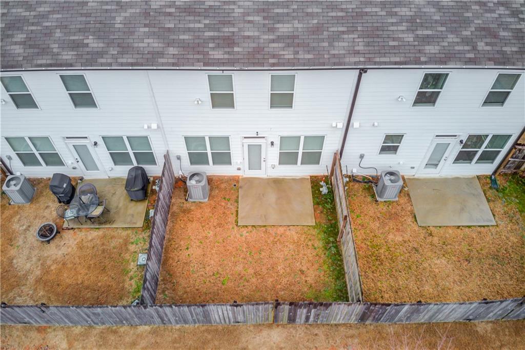74 Cannon Trace Drive Winder, GA 30680 - Photo 37 of 42 an aerial view of residential houses with outdoor space and seating