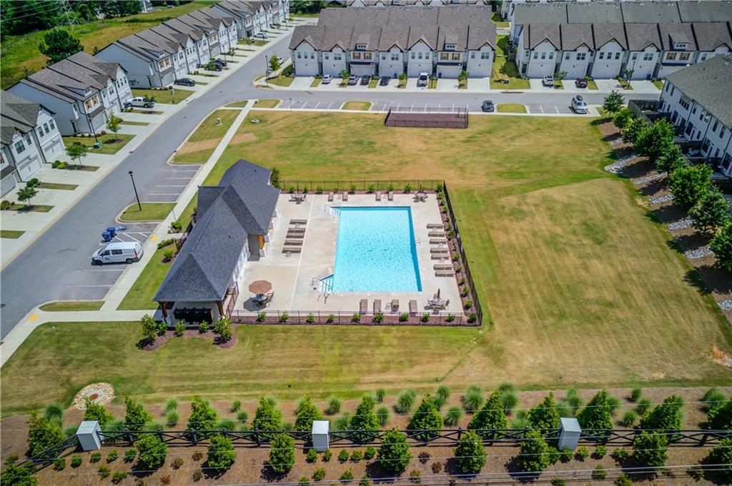 74 Cannon Trace Drive Winder, GA 30680 - Photo 39 of 42 a view of swimming pool with outdoor seating and yard
