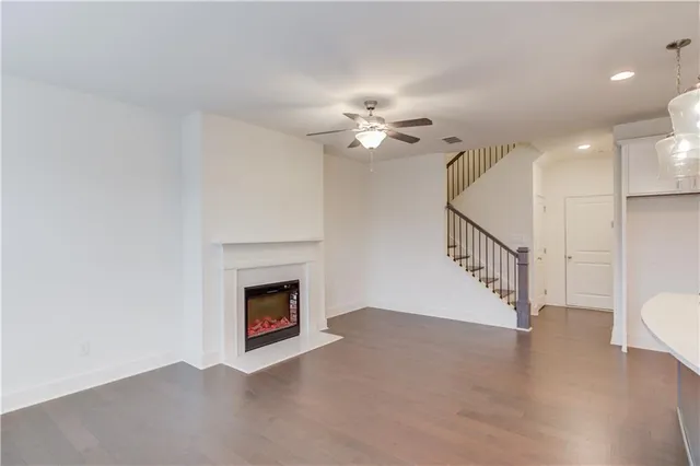 a view of a kitchen with furniture and a fireplace