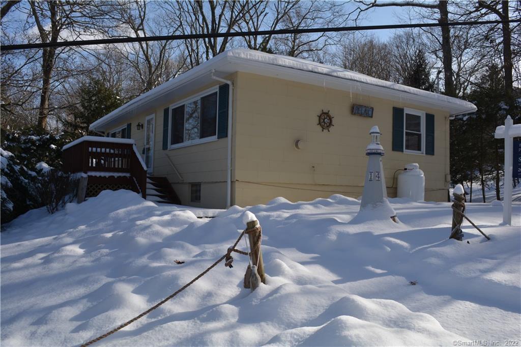 a backyard of a house with seating space