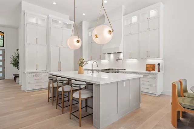 a lobby with furniture and a rug