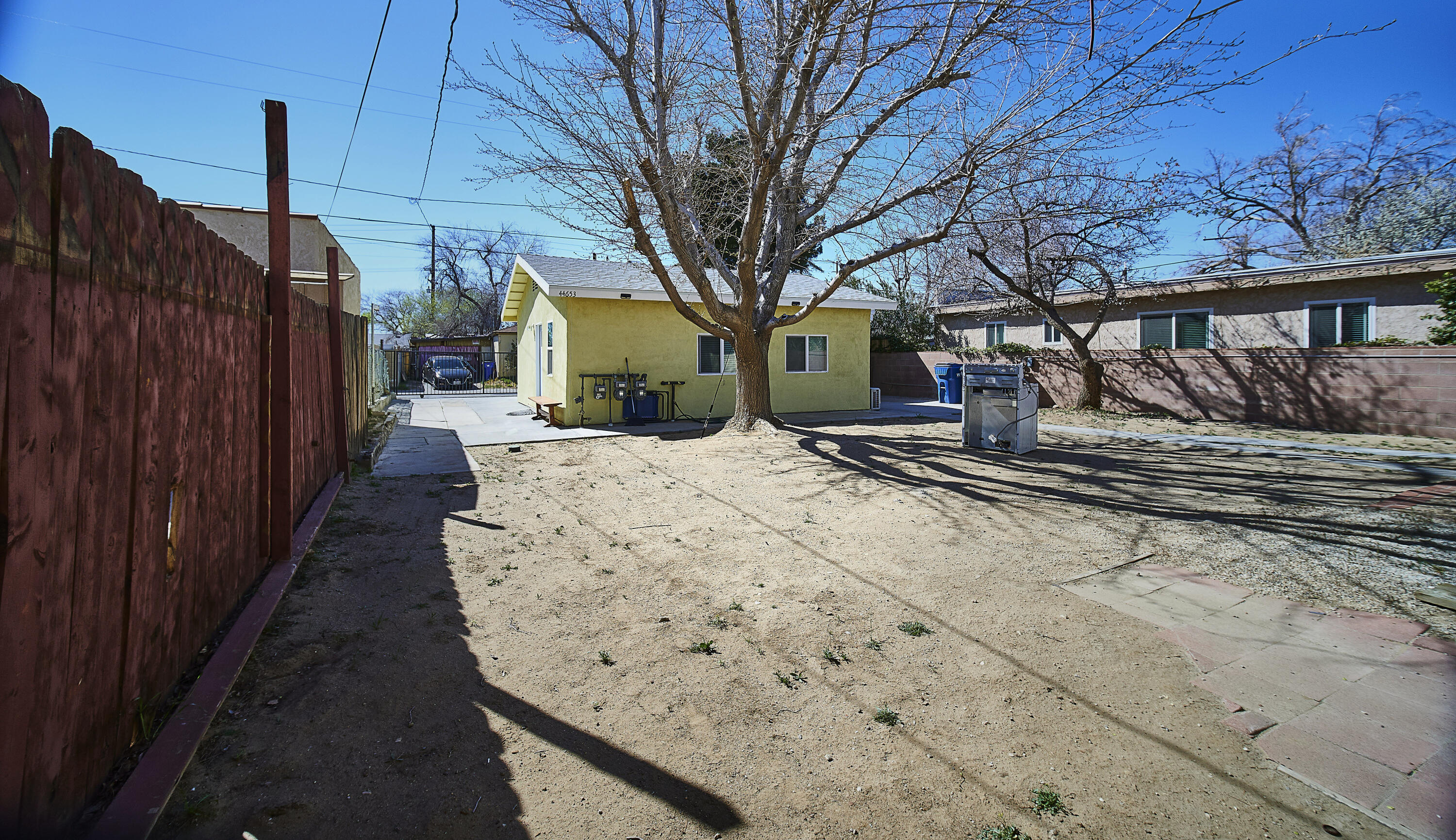 44655 Fig Avenue Lancaster, CA 93534 - Photo 16 of 16 a view of a house with a snow on the road