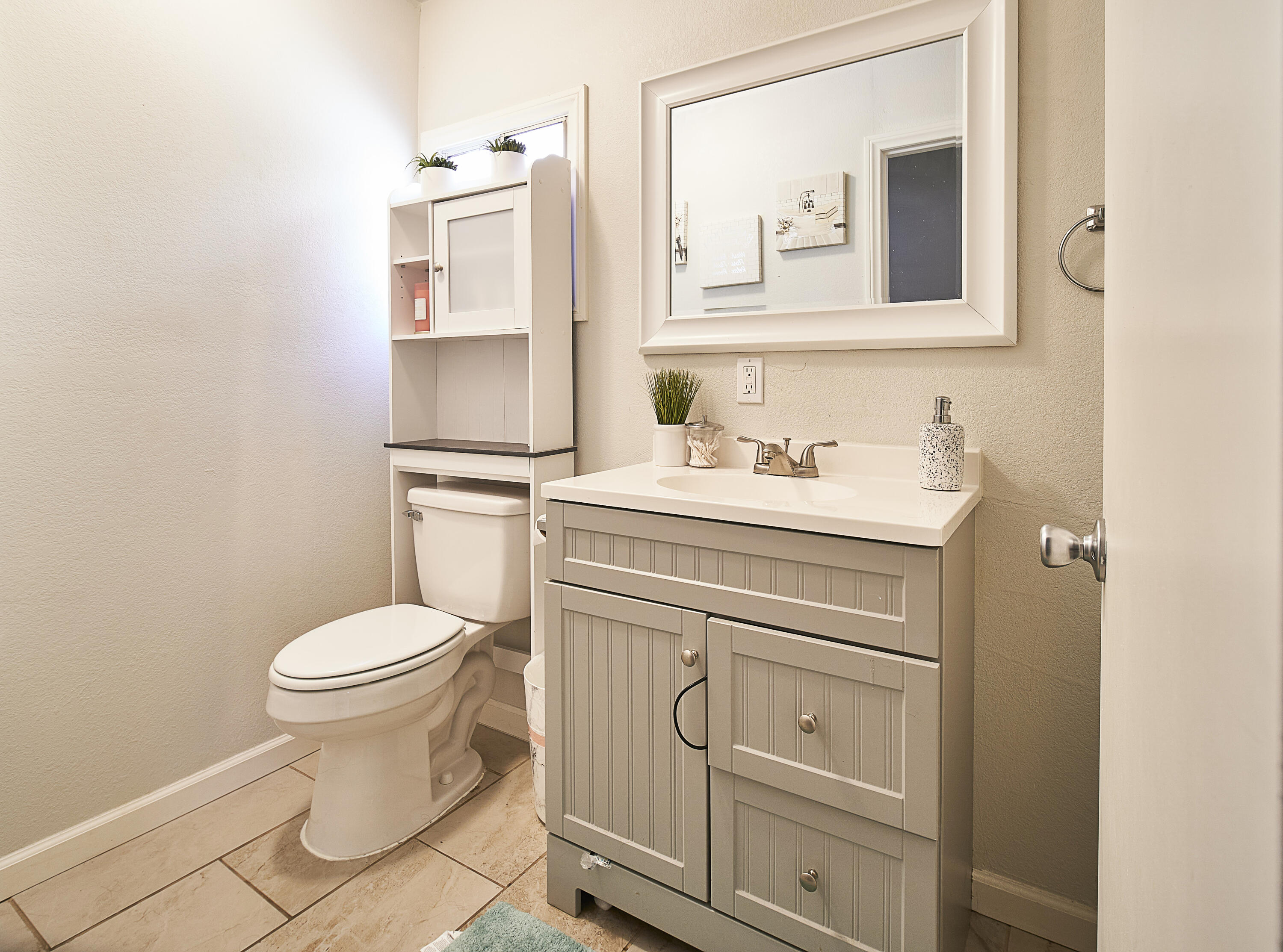 44655 Fig Avenue Lancaster, CA 93534 - Photo 5 of 16 a bathroom with a sink toilet and mirror