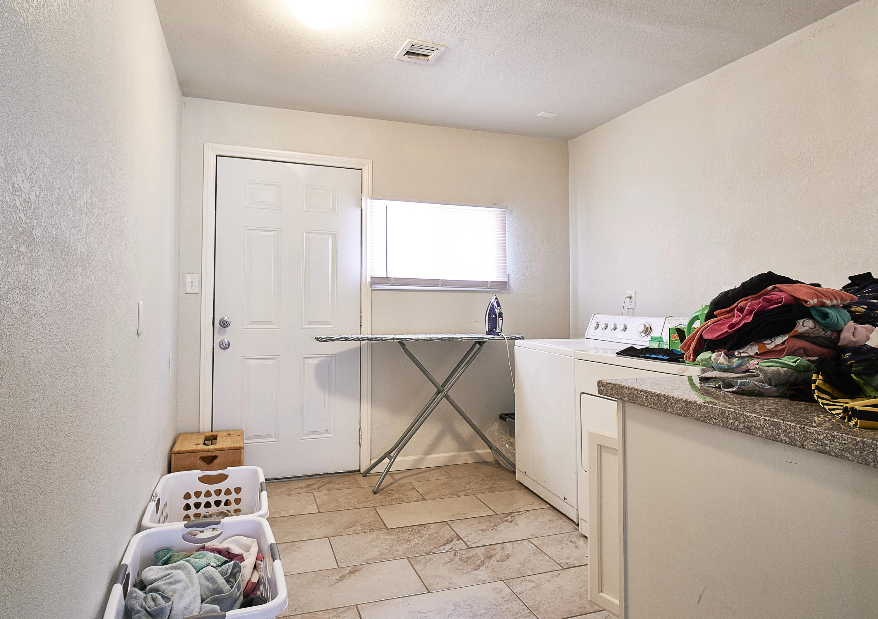 44655 Fig Avenue Lancaster, CA 93534 - Photo 8 of 16 a living room with a rug