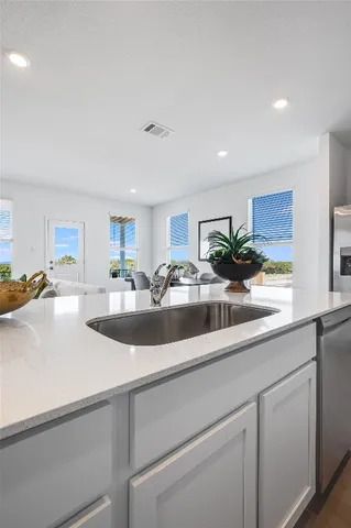 a close view of sink and mirror