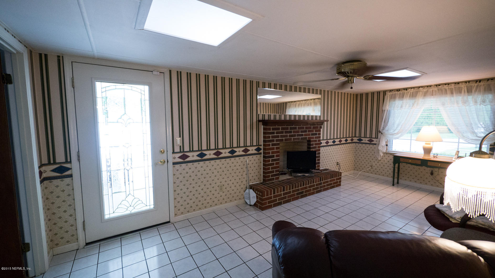 5805 Ridgeway Road East Jacksonville, FL 32244 - Photo 11 of 25 Family Room or Den with Electric Firepla