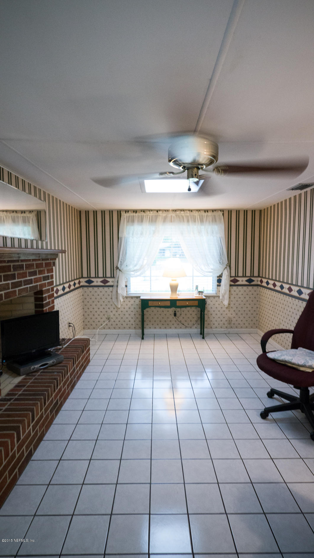 5805 Ridgeway Road East Jacksonville, FL 32244 - Photo 10 of 25 Family Room or Den with Electric Firepla