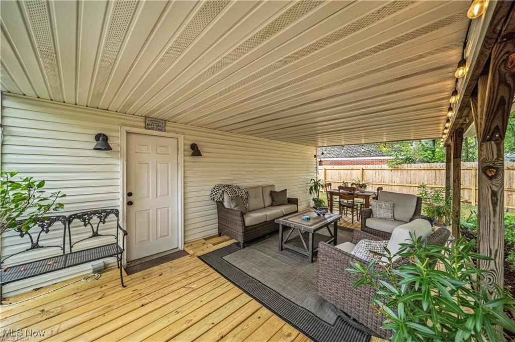 1317 Belrose Road Cleveland, OH 44124 - Photo 46 of 50 Wooden deck with outdoor lounge area and outdoor dining area